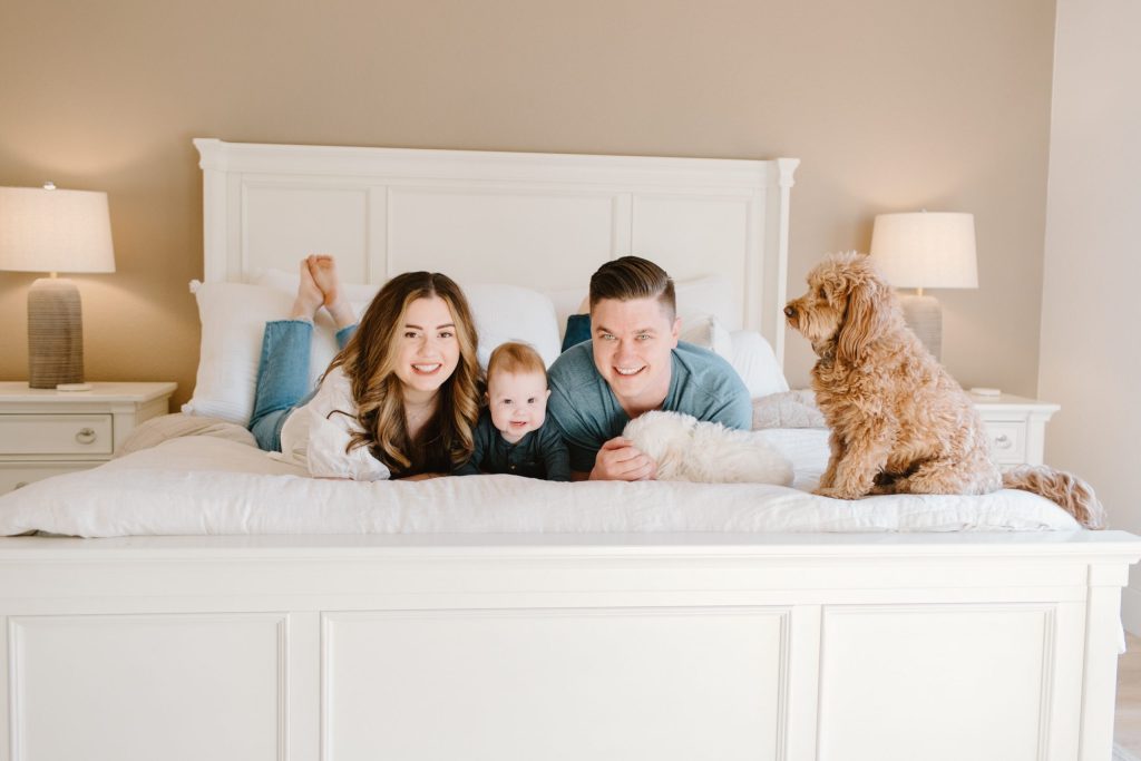 Hailee B. with husband, newborn and dog