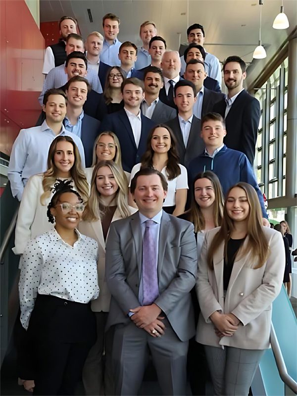 Group photo of Arianna and the 2023 Financial Advisor Development Program (FADP) cadre