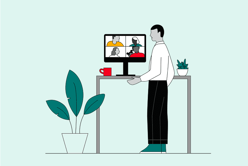 An illustration of a person standing at a desk, engaged in a video call with four individuals. On the desk, a mug and a small plant are visible, with a larger plant on the floor.