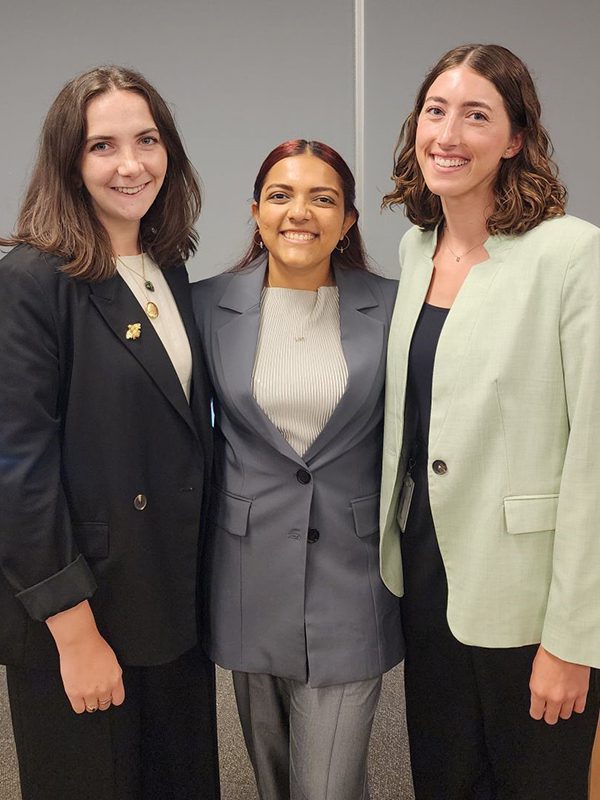 Aashka P., 2022 TLP participant, alongside other members of the 2022 cadre after completing Capstone presentations.